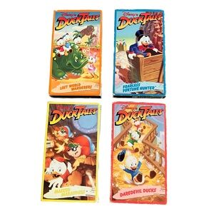 Disney DuckTales VHS Set with Blue, Yellow, Red, and Green Covers